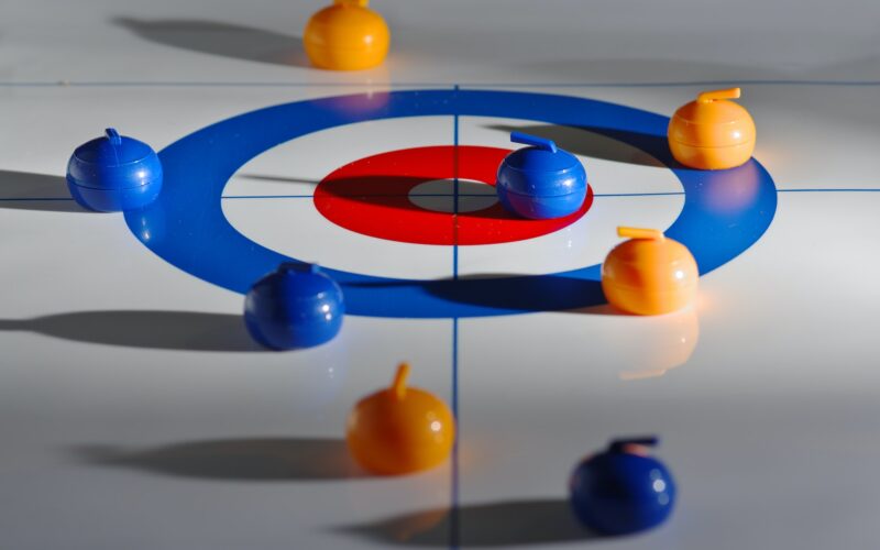 Regler och Strategier i Curling: En Grundläggande Guide